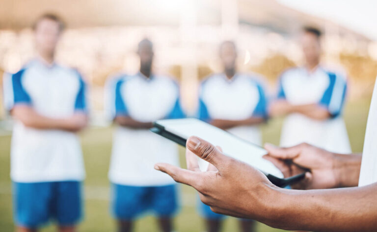 footballers using tablet and cloud computing