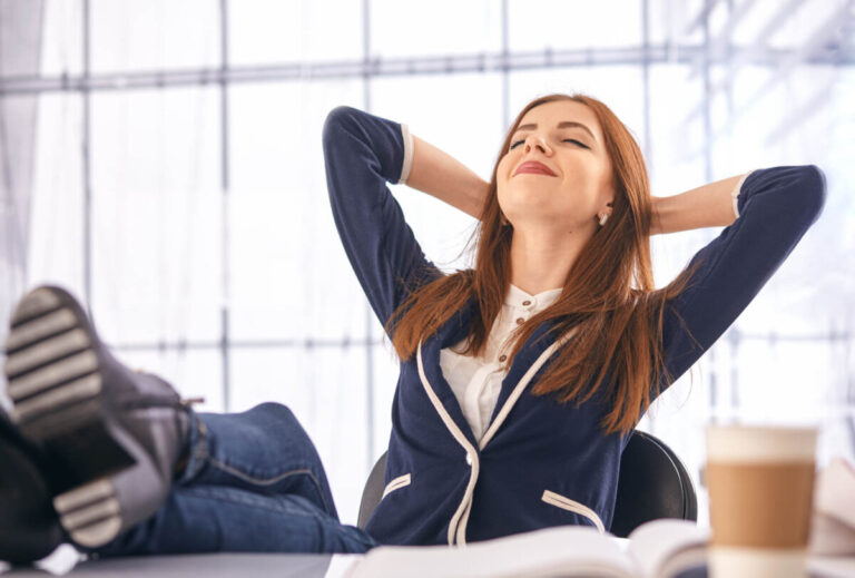 AI meetings your behalf - woman with feet up on desk