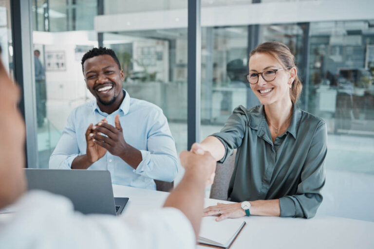 Business people, handshake to celebrate new job