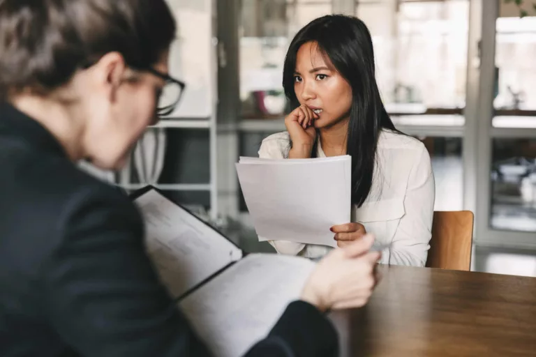 women looking nervous in job interview