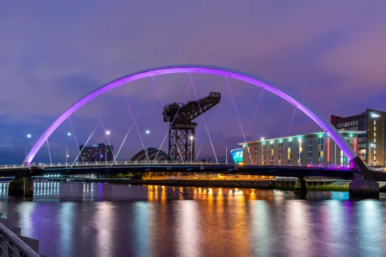 Clyde Arc Bridge along River Clyde. Sunset twilight at Glasgow city, Scotland.