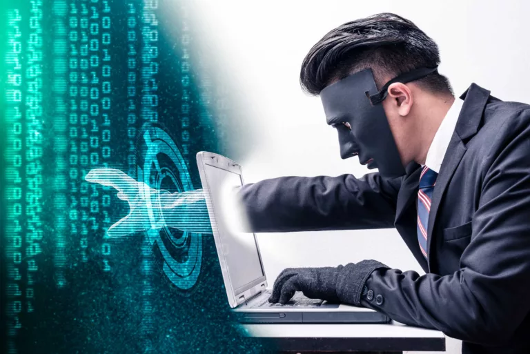 man reaching into laptop to show linkedin email breach