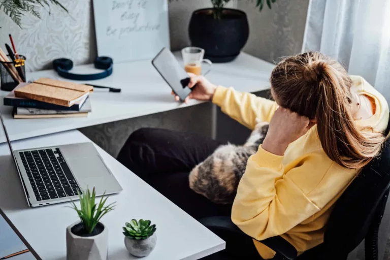 remote worker distracted by phone
