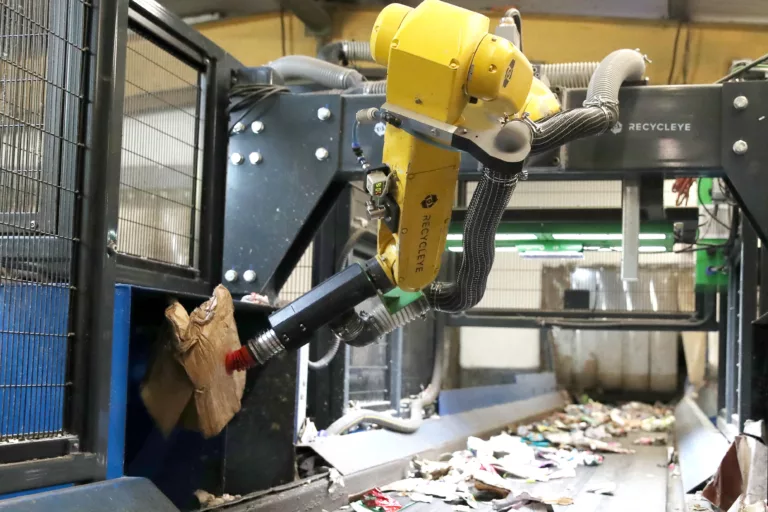 AI robots recycling: robot picking large card