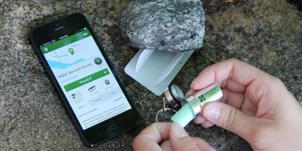 An example geocache and the app open next to it