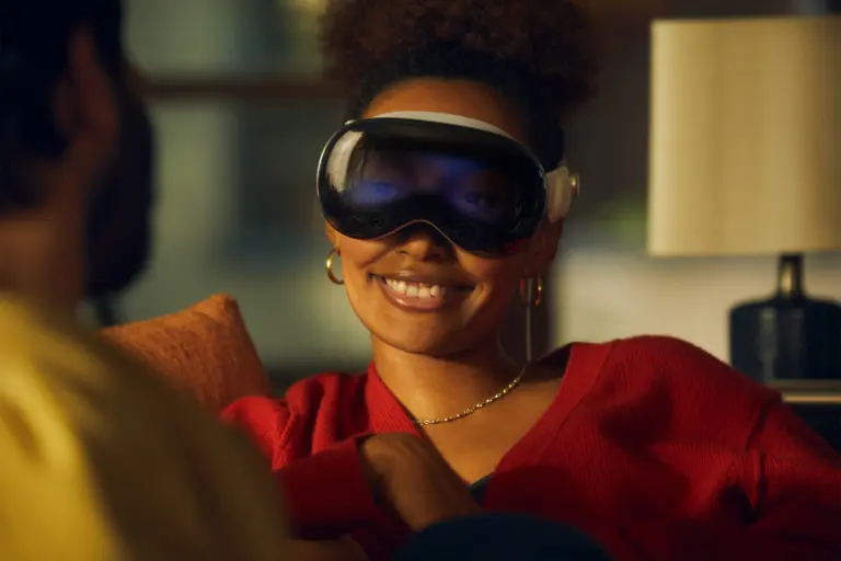 Spatial computing headsets for business - Vision Pro user relaxing