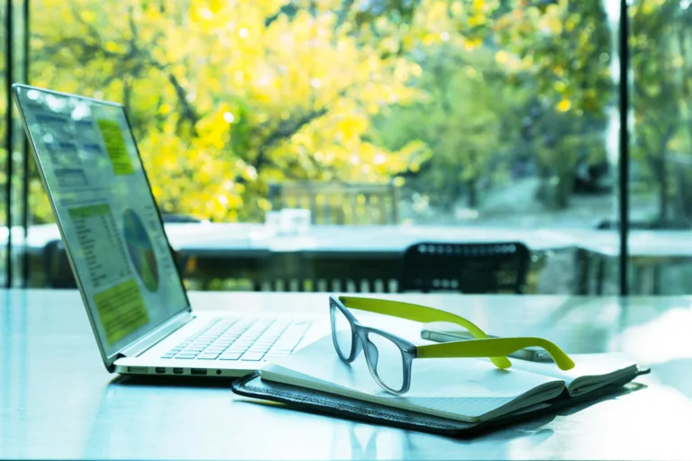 samsung greenwashing - laptop against green background