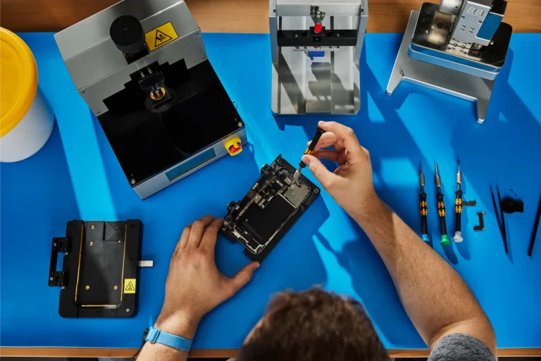 Apple parts pairing shown by person repairing phone
