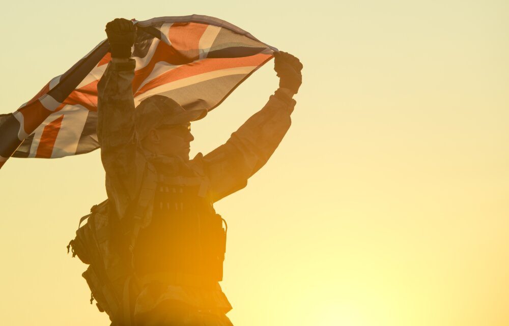 Ministry of Defence attack shown by British Soldier with UK Flag in His Hands