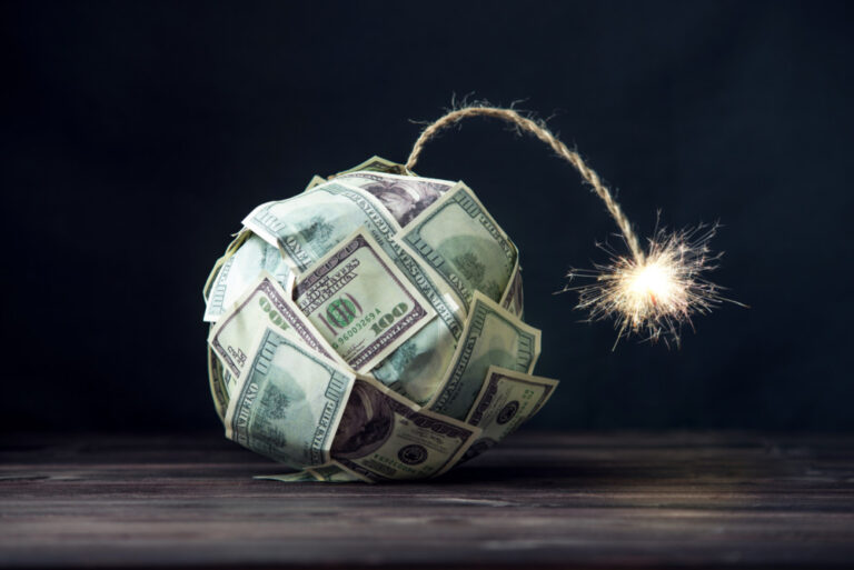AI-driven fraud concept: big bomb of money hundred dollar bills with a burning wick. Little time before the explosion