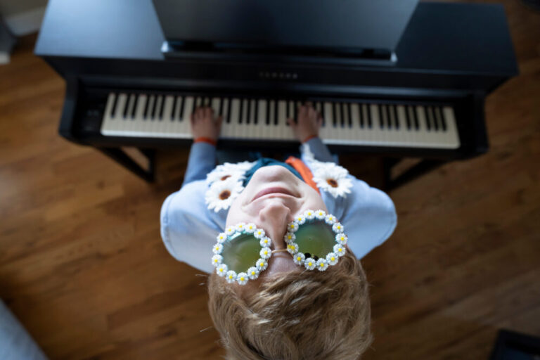 copyright ai uk discussion shown by Elton John lookalike at a piano