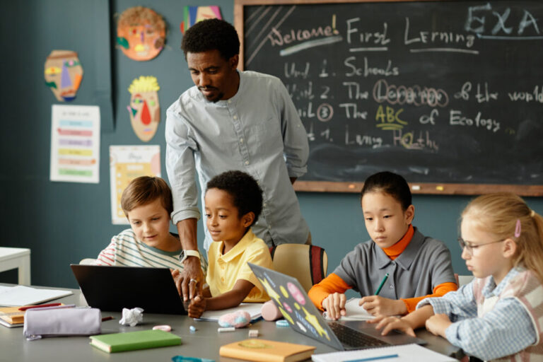 Children using AI in a classroom