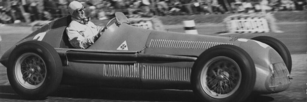 Giuseppe Farina winning the 1950 Grand Prix at Silverstone in the Alfa 158