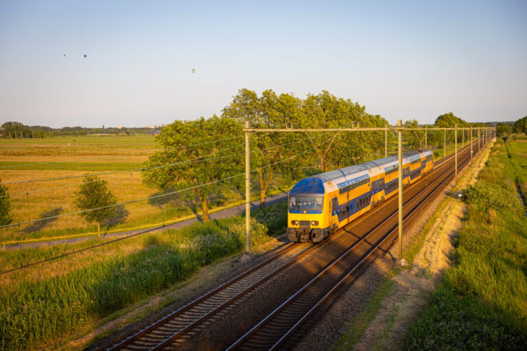 ProRail SAP S/4HANA journey represented by photo of train going from Amsterdam to Amersfoort on ProRail