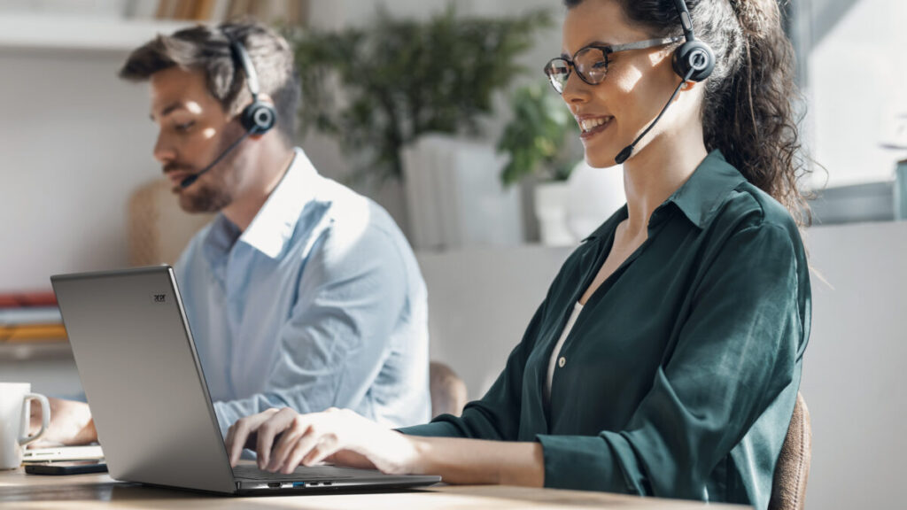 Women making a video call on an Acer TravelMate X4 14 AI in a business situation