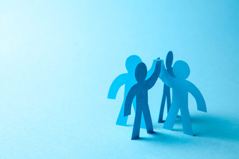 SAP SmartRecruiters partnership shown by figures high-fiving against blue background