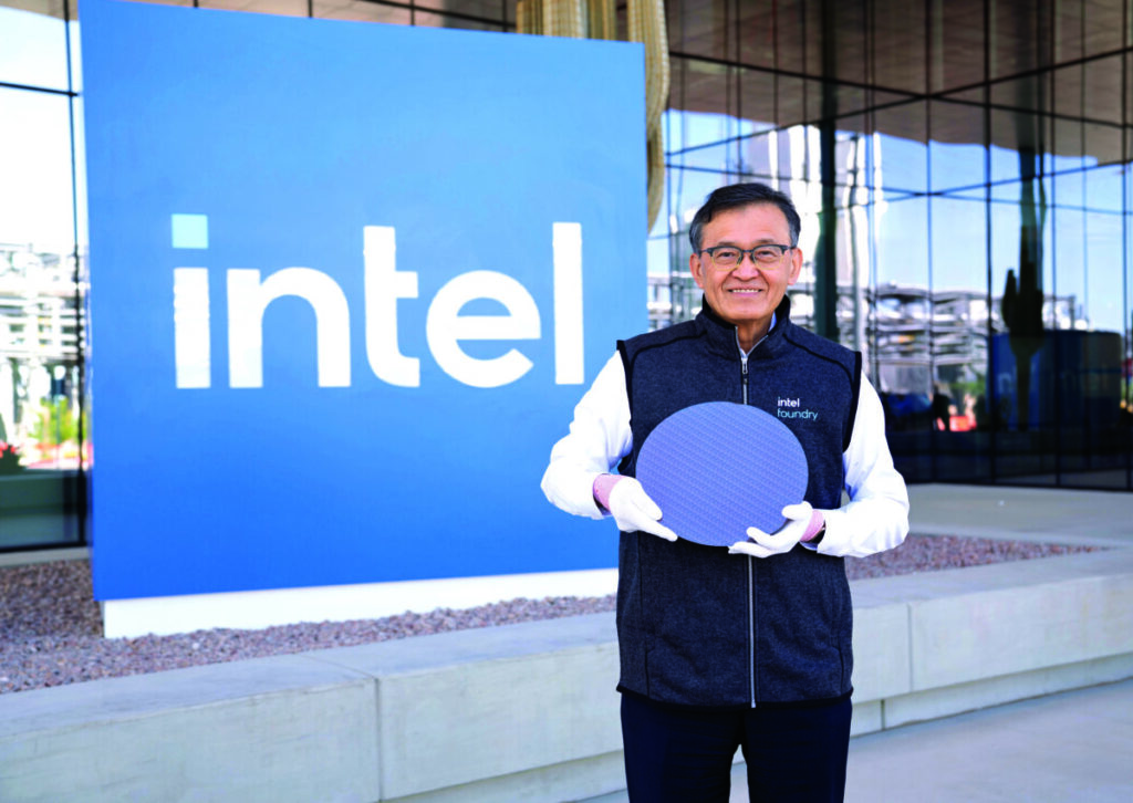 Lip-Bu Tuan holding a wafer full of Panther Lake chips
