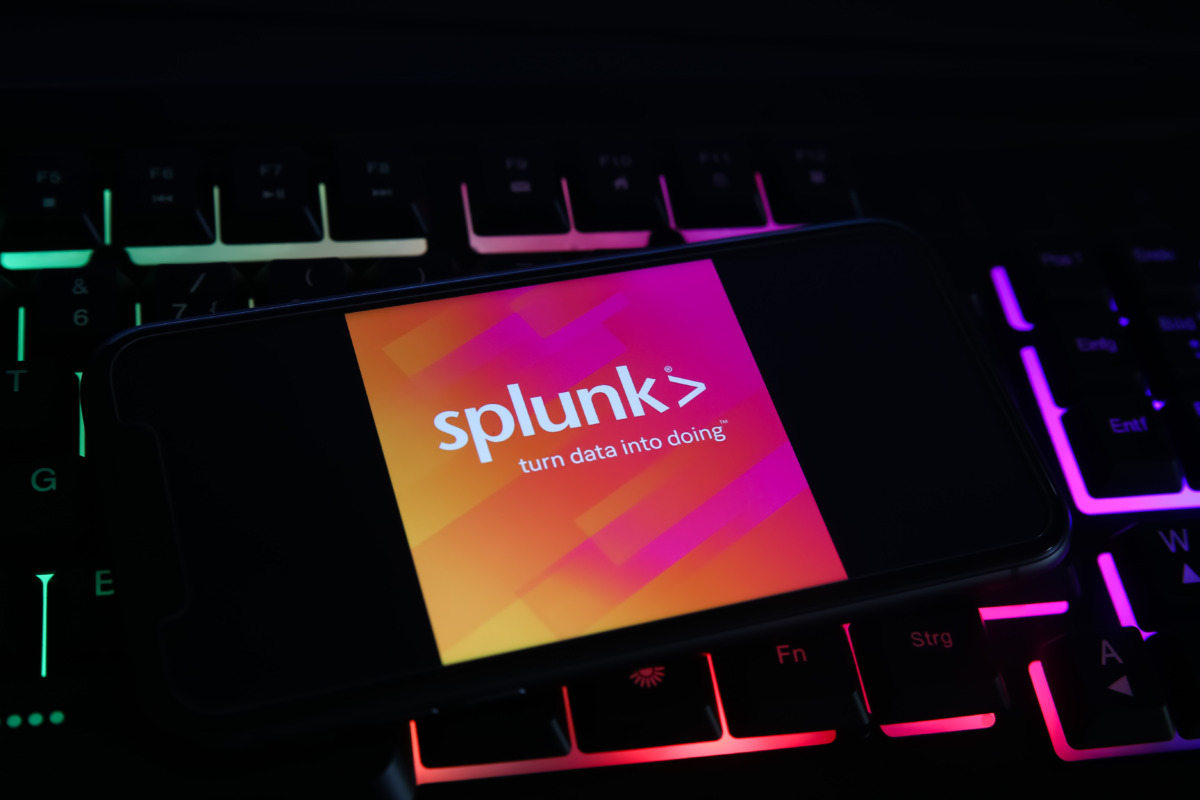Splunk RCE shown by image of phone with Splunk logo against RGB keyboard
