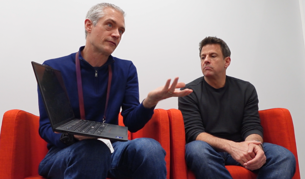 Tom Butler holding the new Lenovo ThinkPad T14