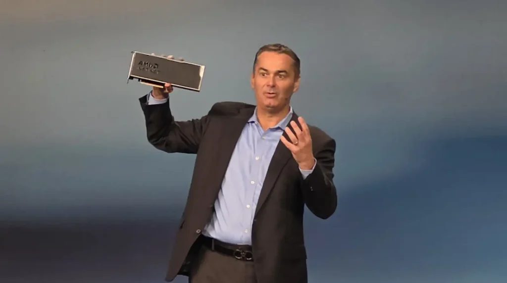 Dan McNamara holding AMD Instinct MI350P card