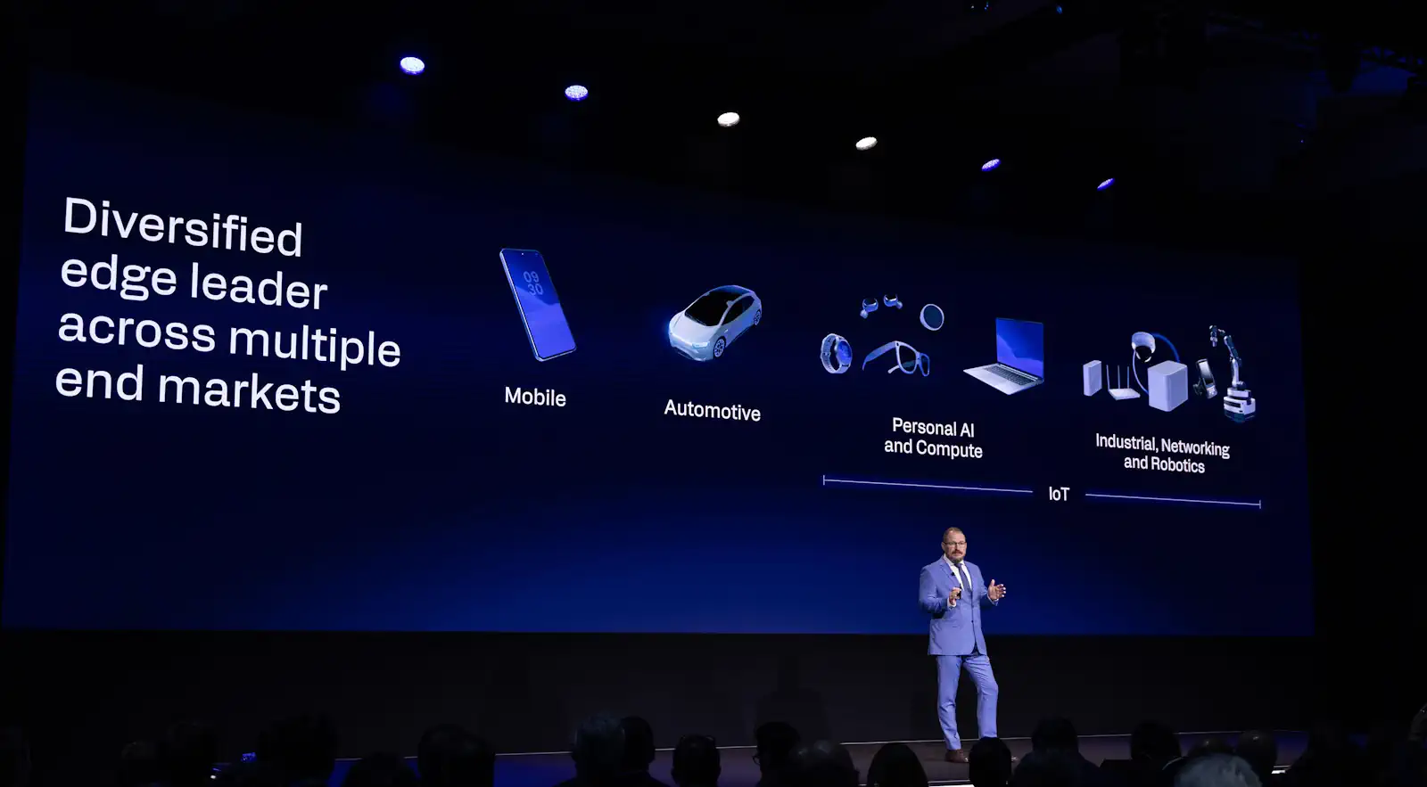 Qualcomm CEO Cristiano Amon on stage at its recent Investment Day