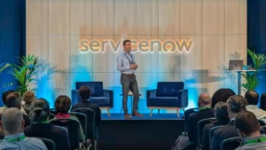 Maxime Chardome, ServiceNow Product Marketing Manager, on stage at the World Forum 2026 (image: ServiceNow)