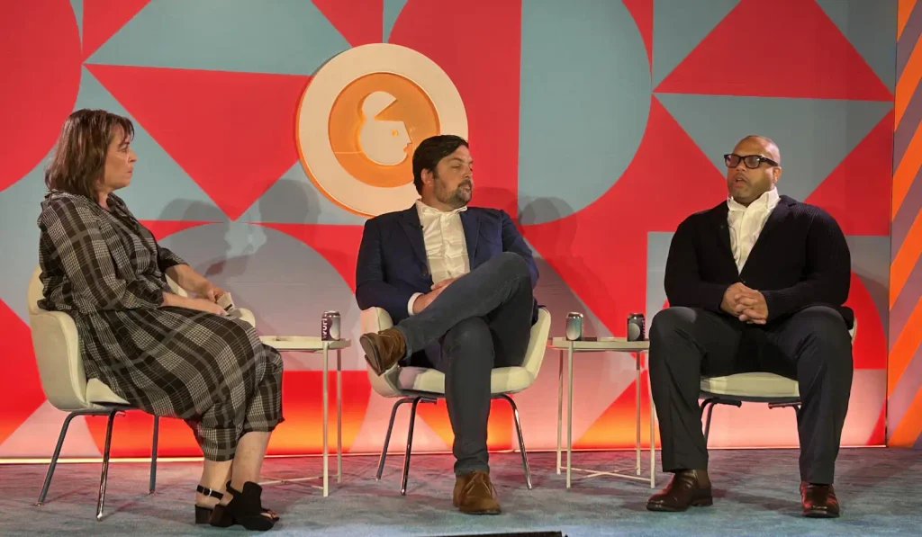 Foxworthy (Snowflake), Mike Treon (PMG) and Jason Dailey (Meta) on stage at Advertising Week New York